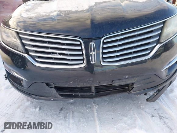 2015 Lincoln MKC with VIN 5LMTJ2AHXFUJ01440, listed as a IAAI auction lot 41526975 with 104,280 mi miles. Bid and sale history available at carsss.com. Image 6.