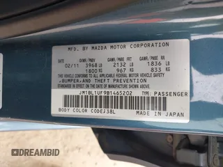 2011 Mazda Mazda3 i Sport with VIN JM1BL1UF9B1465202, listed as a IAAI auction lot 42119001 with 122,198 mi miles. Bid and sale history available at carsss.com. Image 9.