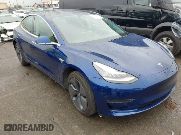 2020 Tesla Model 3 Standard Range Plus with VIN 5YJ3E1EAXLF644679, listed as a IAAI auction lot 41500595 with 53,726 mi miles and . Bid and sale history available at DreamBid. Image 1.