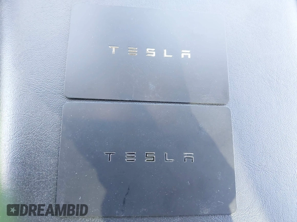 2022 Tesla Model Y Long Range with VIN 7SAYGDEE6NF480471, listed as a IAAI auction lot 41985797 with 82,777 mi miles and . Bid and sale history available at DreamBid. Image 11.