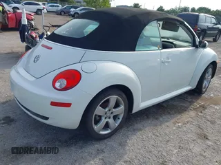 2009 Volkswagen Beetle S with VIN 3VWRF31YX9M402739, listed as a IAAI auction lot 42353898 with Not provided miles and . Bid and sale history available at DreamBid. Image 4.