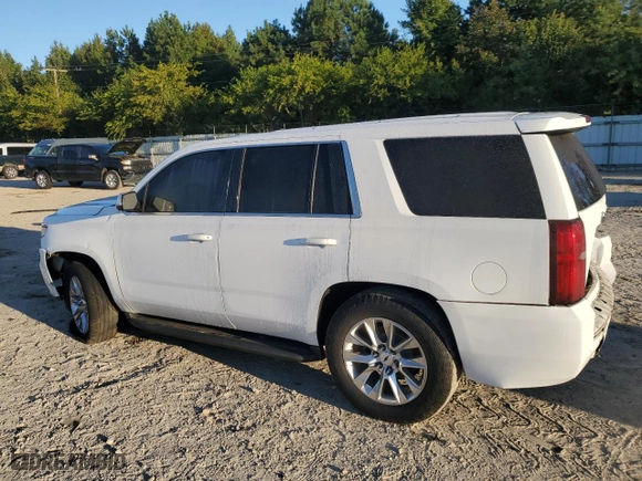 2015 Chevrolet Tahoe Commercial with VIN 1GNSK2ECXFR695889, listed as a Copart auction lot 74369994 with 196,209 mi miles and Salvage Title. Bid and sale history available at carsss.com. Image 2.