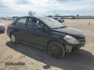 2010 Nissan Versa S with VIN 3N1BC1AP0AL409740, listed as a Copart auction lot 48996685 with 136,924 mi miles and Salvage Title. Bid and sale history available at DreamBid. Image 4.
