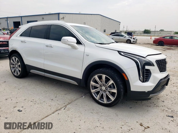 2023 Cadillac XT4 FWD Premium Luxury with VIN 1GYFZCR42PF110122, listed as a Copart auction lot 57332955 with 11,427 mi miles and Salvage title. Bid and sale history available at DreamBid. Image 4.