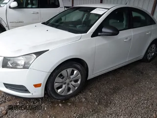 2014 Chevrolet Cruze LS z VIN 1G1PA5SH2E7218766, wystawiony jako IAAI lot #42261991 z przebiegiem 299 485 mil mil oraz . Historia ofert i sprzedaży dostępna na DreamBid. Obrazek 2.