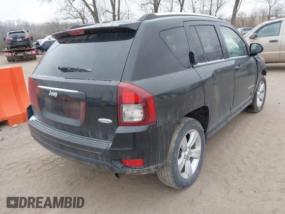 2014 Jeep Compass Latitude with VIN 1C4NJCEA8ED550147, listed as a IAAI auction lot 41405446 with 127,240 mi miles. Bid and sale history available at carsss.com. Image 4.