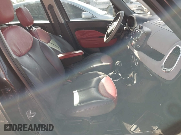 2014 FIAT 500L Easy with VIN ZFBCFABH6EZ028069, listed as a IAAI auction lot 41303148 with 131,757 mi miles and . Bid and sale history available at DreamBid. Image 5.