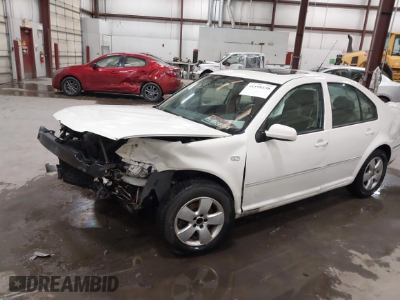 2004 Volkswagen Jetta GLS z VIN 3VWSK69MX4M078023, wystawiony jako IAAI lot #41198138 z przebiegiem 153 830 mil mil oraz . Historia ofert i sprzedaży dostępna na DreamBid. Obrazek 18.