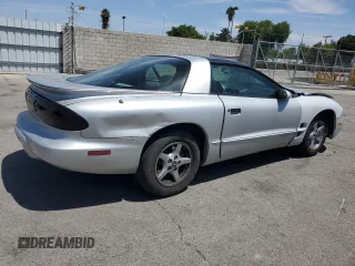 2000 Pontiac Firebird Firebird z VIN 2G2FS22K5Y2116047, wystawiony jako Copart lot #58234695 z przebiegiem 155 876 mil mil oraz Tytuł czysty. Historia ofert i sprzedaży dostępna na DreamBid. Obrazek 3.