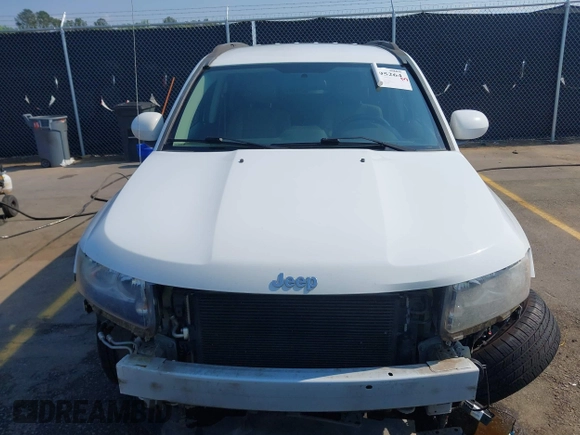 2014 Jeep Compass Latitude with VIN 1C4NJCEB7ED794428, listed as a IAAI auction lot 41995264 with 182,413 mi miles. Bid and sale history available at carsss.com. Image 13.