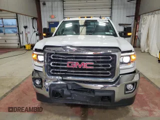 2018 GMC Sierra 2500HD SLE z VIN 1GT22SEG0JZ239825, wystawiony jako Copart lot #50648115 z przebiegiem 77 851 mil mil oraz Szkody całkowita. Historia ofert i sprzedaży dostępna na DreamBid. Obrazek 5.