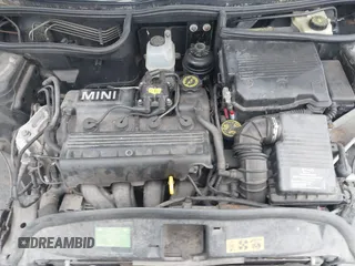 2005 MINI Hardtop with VIN WMWRC33535TJ70850, listed as a IAAI auction lot 42219720 with 66,398 mi miles and . Bid and sale history available at DreamBid. Image 10.