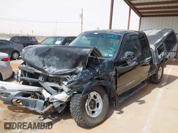 1999 Ford F-150 XL with VIN 1FTRX08L3XKB12260, listed as a IAAI auction lot 42244781 with Not provided miles and . Bid and sale history available at DreamBid. Image 6.