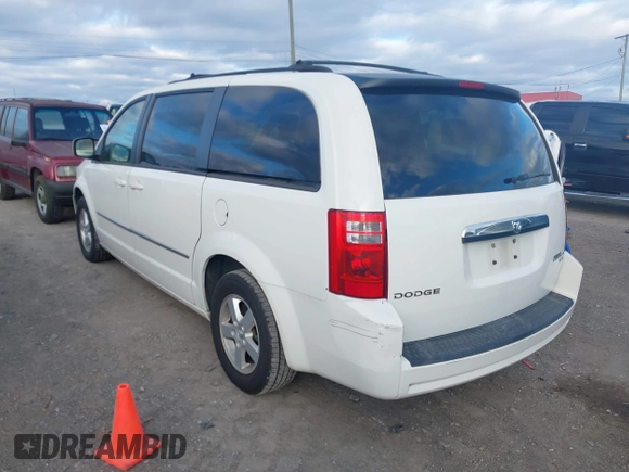 2010 Dodge Grand Caravan SXT with VIN 2D4RN5D17AR444818, listed as a IAAI auction lot 40941591 with Not Provided miles and . Bid and sale history available at DreamBid. Image 3.