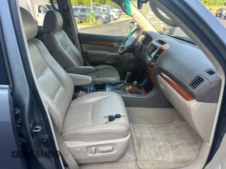 2005 Lexus GX 470 z VIN JTJBT20X050076167, wystawiony jako Copart lot #59916595 z przebiegiem 297 768 mil mil oraz Czysty tytuł • Clean title. Historia ofert i sprzedaży dostępna na DreamBid. Obrazek 5.