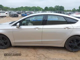 2016 Ford Fusion SE with VIN 3FA6P0H79GR244527, listed as a IAAI auction lot 42418273 with 148,052 mi miles and . Bid and sale history available at DreamBid. Image 14.