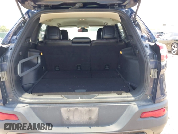 2015 Jeep Cherokee Trailhawk with VIN 1C4PJMBS3FW704622, listed as a IAAI auction lot 42465702 with 96,831 mi miles and . Bid and sale history available at DreamBid. Image 16.