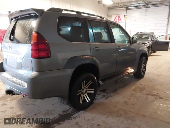 2004 Lexus GX 470 with VIN JTJBT20X540056639, listed as a IAAI auction lot 41744622 with 228,326 mi miles. Bid and sale history available at carsss.com. Image 4.