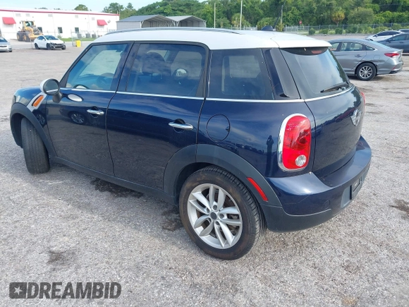 2013 MINI Countryman with VIN WMWZB3C5XDWM31035, listed as a IAAI auction lot 42543943 with 151,209 mi miles and . Bid and sale history available at DreamBid. Image 3.