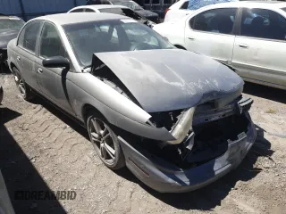 1999 Saturn SL z VIN 1G8ZK5271XZ316032, wystawiony jako Copart lot #50663015 z przebiegiem 164 288 mil mil oraz Nie do naprawy. Historia ofert i sprzedaży dostępna na DreamBid. Obrazek 4.