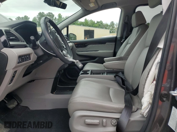 2023 Honda Odyssey Touring with VIN 5FNRL6H86PB024066, listed as a Copart auction lot 58414575 with 29,827 mi miles and Salvage title. Bid and sale history available at DreamBid. Image 7.