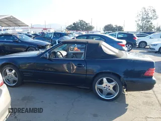2001 Mercedes-Benz SL-Class with VIN WDBFA68F81F197287, listed as a IAAI auction lot 41442362 with 127,628 mi miles. Bid and sale history available at carsss.com. Image 14.
