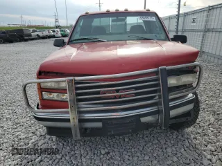 1999 GMC Sierra 2500 z VIN 1GTGK29R3XF020000, wystawiony jako Copart lot #53698755 z przebiegiem 241 366 mil mil oraz Szkody całkowita. Historia ofert i sprzedaży dostępna na DreamBid. Obrazek 5.