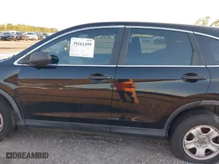 2015 Honda CR-V LX with VIN 2HKRM3H38FH512323, listed as a IAAI auction lot 39161499 with 133,787 mi miles. Bid and sale history available at carsss.com. Image 15.