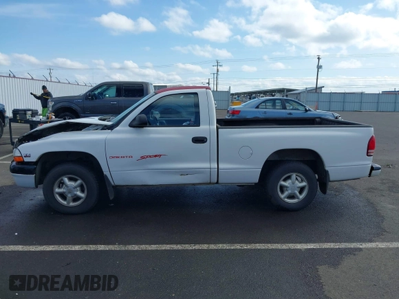 1999 Dodge Dakota SLT with VIN 1B7FL26X9XS109444, listed as a IAAI auction lot 41753871 with 254,190 mi miles. Bid and sale history available at carsss.com. Image 14.