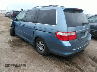 2006 Honda Odyssey EX with VIN 5FNRL38436B086177, listed as a IAAI auction lot 41219596 with 123,455 mi miles. Bid and sale history available at carsss.com. Image 3.