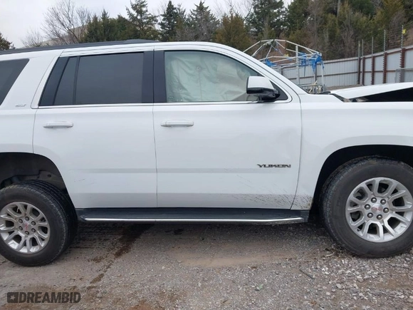 2019 GMC Yukon SLT with VIN 1GKS2BKC6KR183607, listed as a IAAI auction lot 41557880 with 120,971 mi miles. Bid and sale history available at carsss.com. Image 13.