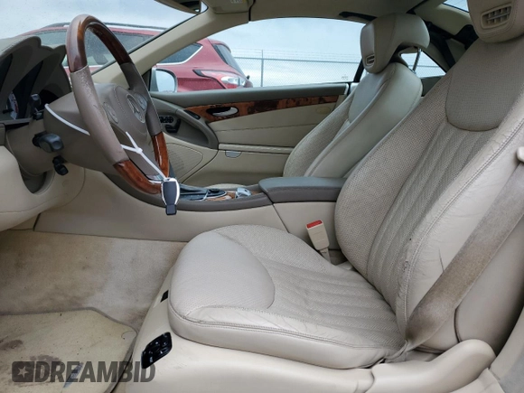 2009 Mercedes-Benz SL 550 with VIN WDBSK71F49F143492, listed as a Copart auction lot 88757425 with 89,117 mi miles and Salvage title. Bid and sale history available at DreamBid. Image 7.