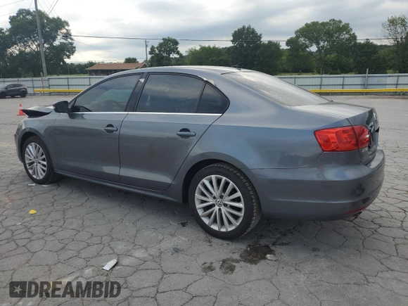 2013 Volkswagen Jetta TDI w/Premium/Nav с VIN 3VWLL7AJ4DM412457, выставлен на аукционе Copart как лот 62503225 с пробегом 91 045 миль миль и Чистый • Clean title. История ставок и продаж доступна на DreamBid. Изображение 2.