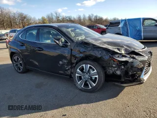 2023 Lexus UX 250h Premium с VIN JTHP9JBH8P2069805, выставлен на аукционе Copart как лот 87671095 с пробегом 12 599 миль миль и Списание • Salvage title. История ставок и продаж доступна на DreamBid. Изображение 4.