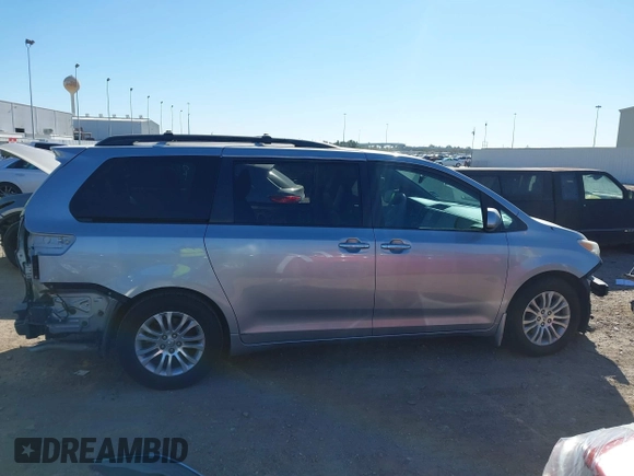 2014 Toyota Sienna XLE with VIN 5TDYK3DC7ES447903, listed as a IAAI auction lot 41835665 with 224,492 mi miles. Bid and sale history available at carsss.com. Image 14.