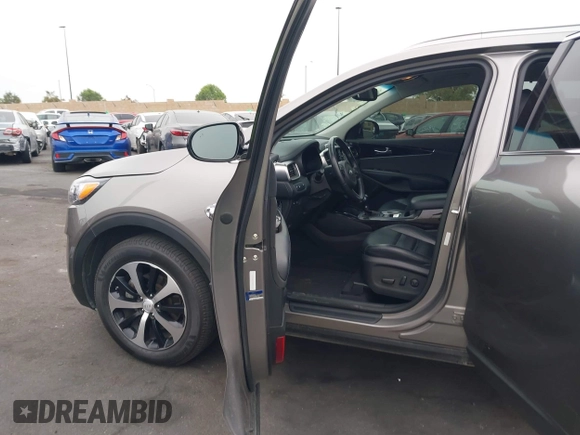 2018 Kia Sorento EX with VIN 5XYPH4A59JG394960, listed as a IAAI auction lot 42342621 with 158,056 mi miles and . Bid and sale history available at DreamBid. Image 5.