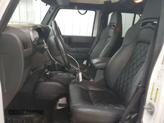 2012 Jeep Wrangler Unlimited Sport z VIN 1C4BJWDG4CL140250, wystawiony jako Copart lot #55174665 z przebiegiem 91 285 mil mil oraz Szkoda całkowita • Salvage title. Historia ofert i sprzedaży dostępna na DreamBid. Obrazek 7.