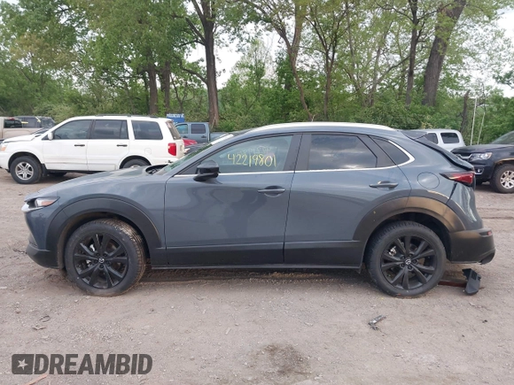 2023 Mazda CX-30 S Carbon Edition with VIN 3MVDMBCM4PM577619, listed as a IAAI auction lot 42219801 with 24,784 mi miles and . Bid and sale history available at DreamBid. Image 14.