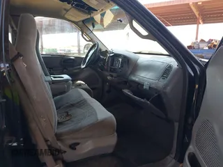2000 Ford F-150 XL z VIN 1FTRX18L1YNA05567, wystawiony jako IAAI lot #42054536 z przebiegiem 245 018 mil mil oraz . Historia ofert i sprzedaży dostępna na DreamBid. Obrazek 5.