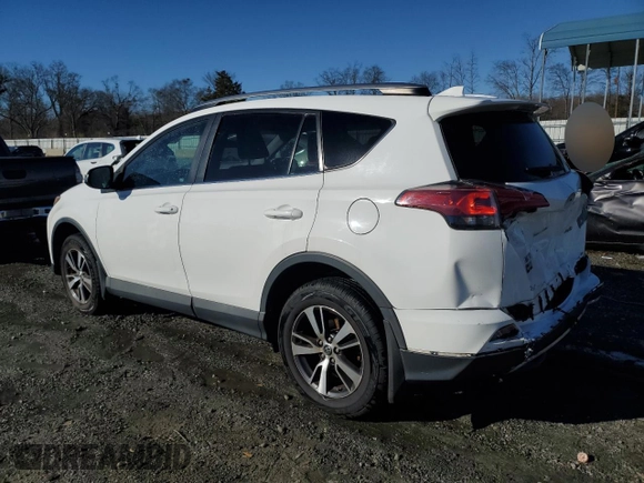 2018 Toyota RAV4 XLE with VIN 2T3WFREV2JW454202, listed as a Copart auction lot 41599855 with 144,442 mi miles and Salvage title. Bid and sale history available at DreamBid. Image 2.