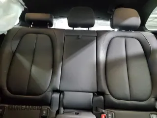 2017 BMW X1 xDrive28i with VIN WBXHT3Z38H4A53824, listed as a Copart auction lot 52500215 with 106,782 mi miles and Salvage title. Bid and sale history available at DreamBid. Image 10.