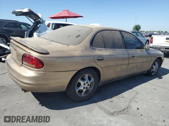 1998 Oldsmobile Intrigue GL z VIN 1G3WS52K1WF373652, wystawiony jako Copart lot #72822084 z przebiegiem 221 028 mil mil oraz Szkoda całkowita • Salvage title. Historia ofert i sprzedaży dostępna na DreamBid. Obrazek 3.