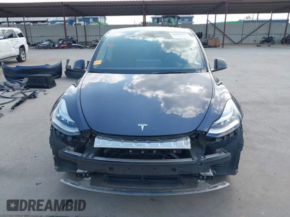 2023 Tesla Model Y Long Range with VIN 7SAYGDEEXPA078629, listed as a IAAI auction lot 42046354 with 27,245 mi miles and . Bid and sale history available at DreamBid. Image 13.