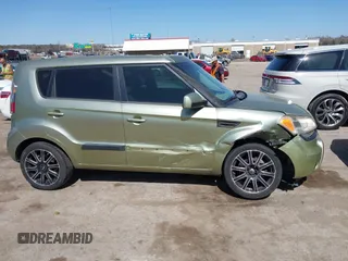 2011 Kia Soul + with VIN KNDJT2A22B7330062, listed as a IAAI auction lot 41772382 with 170,000 mi miles. Bid and sale history available at carsss.com. Image 13.