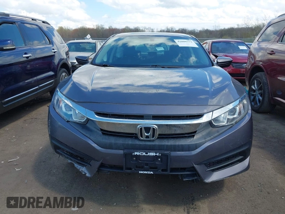 2018 Honda Civic LX with VIN 2HGFC2F5XJH586527, listed as a IAAI auction lot 42080372 with 52,114 mi miles and . Bid and sale history available at DreamBid. Image 13.