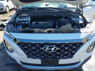 2020 Hyundai Santa Fe Limited with VIN 5NMS5CAA0LH150391, listed as a IAAI auction lot 41651076 with 66,713 mi miles. Bid and sale history available at carsss.com. Image 10.