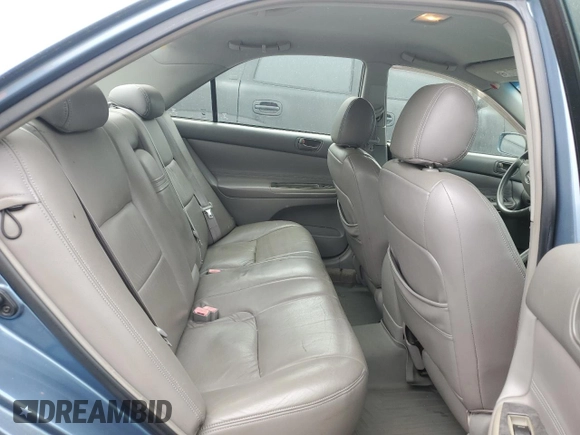 2002 Toyota Camry LE z VIN 4T1BE32K82U635971, wystawiony jako Copart lot #60784855 z przebiegiem Nie podano mil oraz Szkoda całkowita • Salvage title. Historia ofert i sprzedaży dostępna na DreamBid. Obrazek 10.