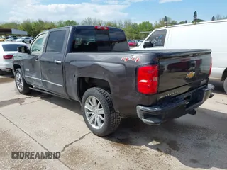 2014 Chevrolet Silverado 1500 High Country with VIN 3GCUKTEC8EG399193, listed as a IAAI auction lot 41789709 with 207,890 mi miles. Bid and sale history available at carsss.com. Image 3.
