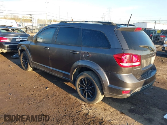 2019 Dodge Journey SE with VIN 3C4PDCBB2KT873970, listed as a IAAI auction lot 41864725 with 91,240 mi miles and . Bid and sale history available at DreamBid. Image 3.