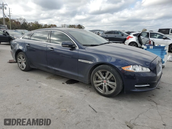 2015 Jaguar XJ Portfolio with VIN SAJWA2GZ9F8V79511, listed as a Copart auction lot 78453394 with 53,341 mi miles and Salvage title. Bid and sale history available at DreamBid. Image 4.